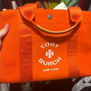 Tory Burch/Kate Spade bags, Burch has tags attached, Kate Spade has tags inside.
